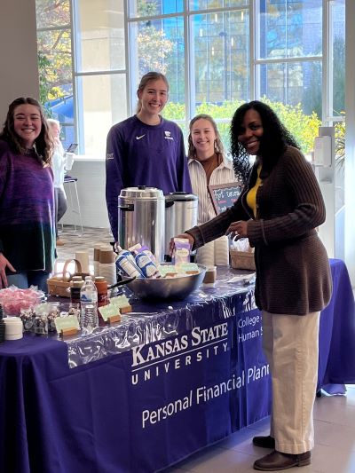 Event staff and faculty at hot cocoa bar